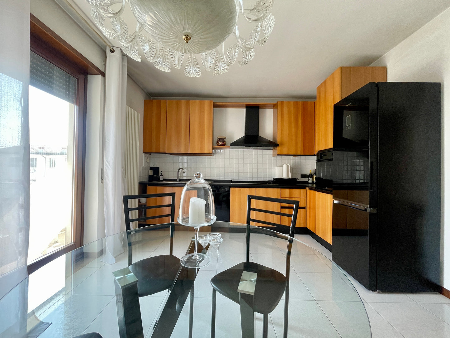 Casa a schiera di testa con giardino