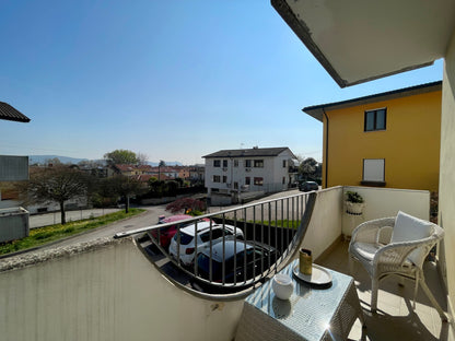 Casa a schiera di testa con giardino