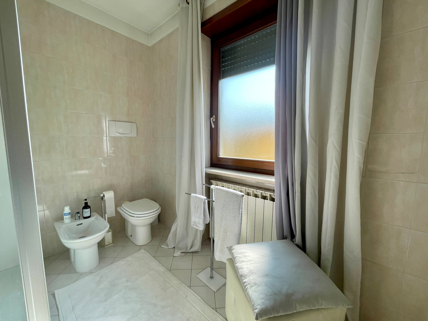 Casa a schiera di testa con giardino