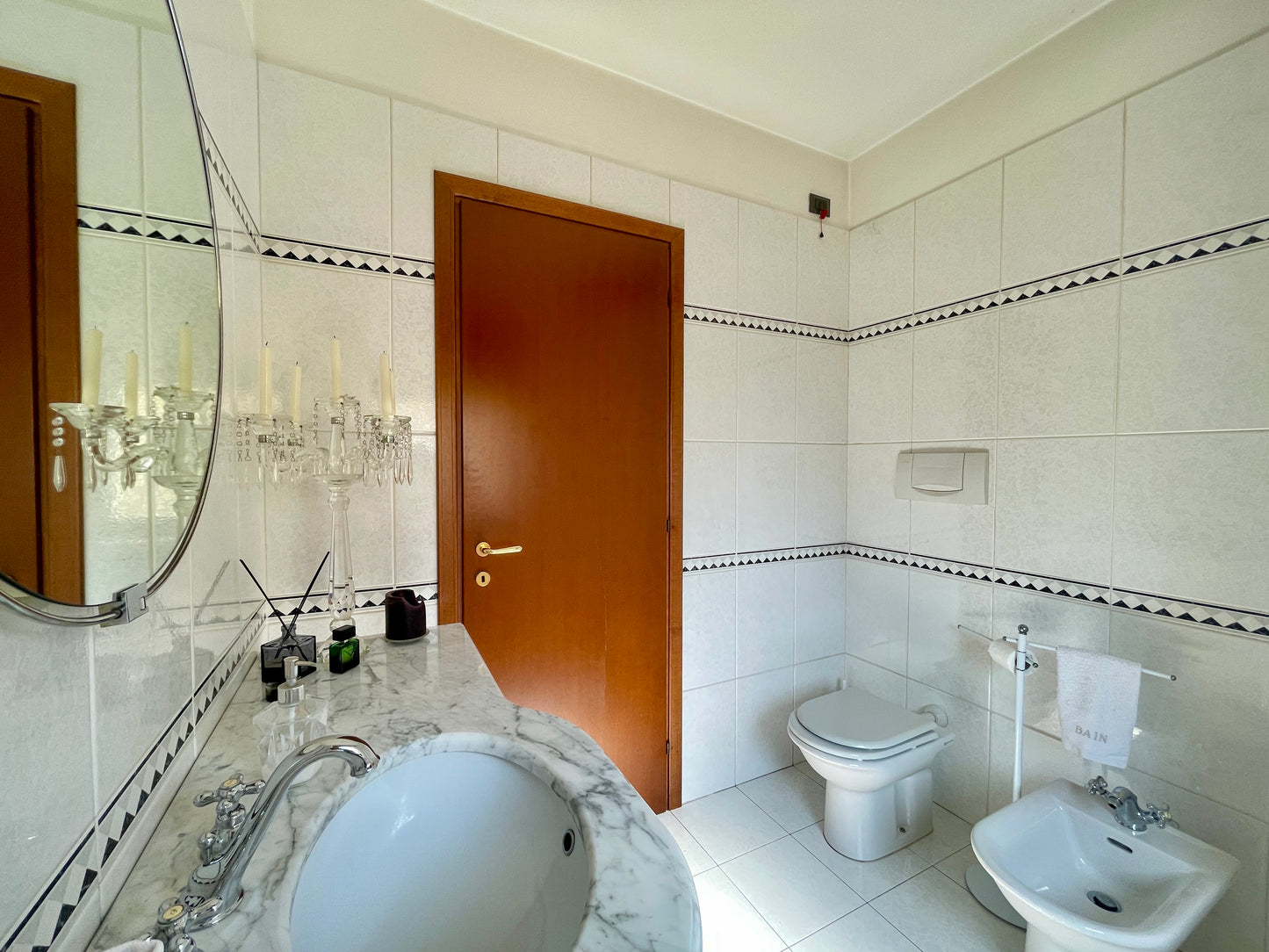Casa a schiera di testa con giardino
