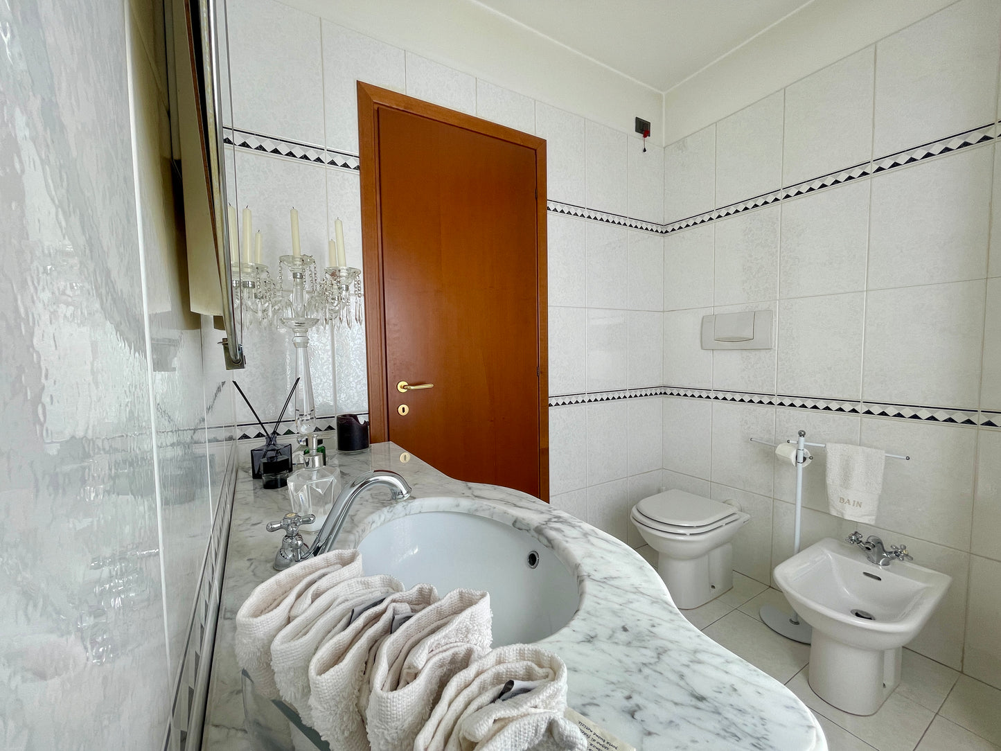Casa a schiera di testa con giardino